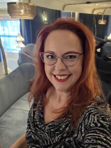 Las Vegas masseuse smiling at the beginning of a luxury erotic massage date