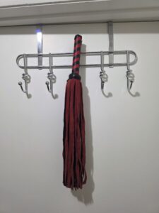 Suede flogger used for Las Vegas spanking and BDSM play